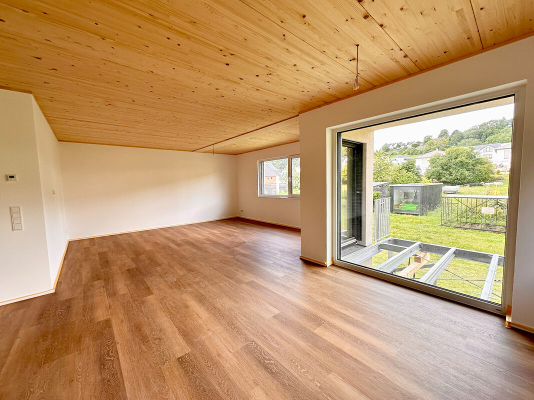 Wohnraum im Mehrfamilienhaus. Eine Referenz von Holzbau Henz.